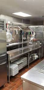 lot 14 image: Stainless Steel Prep Table w Shelf & Hanging Racks, Measures 116 x 82 x 33, Contents Not Included