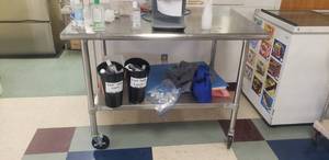 lot 8 image: Duke Stainless Steel Rolling Prep Table , Model 316S M, Contents Not Included