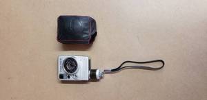 lot 37 image: Vintage Canon Dial 35, 35 Millimeter Camera with Case