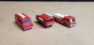 lot 124 image: Lot of 3 Vintage Matchbox Fire Trucks -Land Rover Fire Truck No. 57, Foamite Crash Tender No. 63, Fire Pumper Truck No. 29