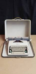 lot 136 image: Vintage Olympia Typewriter with Case - Made is West Germany