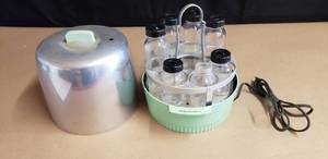 lot 139 image: Vintage Hankscraft Baby Bottle Warmer with Glass Evenflo Bottles