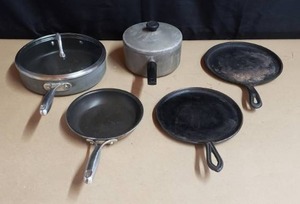 lot 193 image: Lot of 5 Pots & Pans - Wear-Ever, Lodge, and More