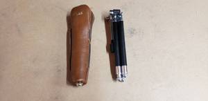 lot 212 image: Vintage Atlas Telescoping Tripod with Leather Case