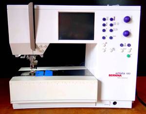 lot 301 image: Bernina Artista 180 Sewing Machine Foot Controller, Manuals, add on Accessories, and Cases (orig retail over $600)