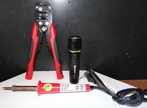lot 214 image: ELECTRICIAN PLIERS, 3 COLOR FLASHLIGHT, AND SOLDERING IRON