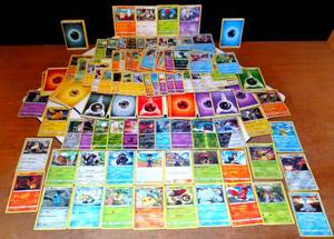 lot 304 image: POKEMON - LARGE 126 CARD COLLECTION INCLUDING 14 HOLOS