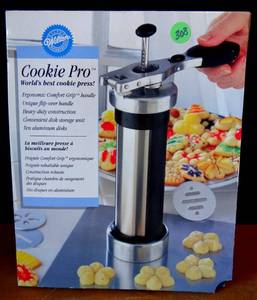 lot 308 image: Vintage Wilton Stainless Steel Cookie Pro - NEW IN BOX