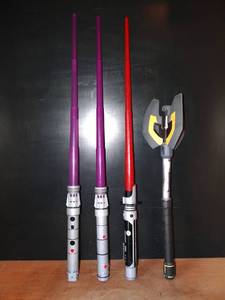 lot 320 image: TOY LOT - 3 DISNEY STAR WAR STYLE LIGHT SABERS AND 1 NERF AXE