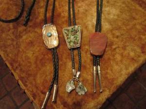 lot 18 image: 3 UNIQUE BOLO TIES, ONE CONTAINS VARIETY OF SEVERAL POLISHED ROCKS &amp MINERALS, 1 SILVER W TURQUOISE, 1 JASPER