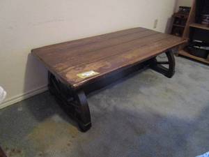 lot 38 image: WOODEN WAGON WHEEL COFFEE TABLE