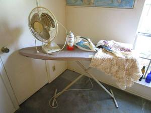 lot 72 image: IRONING BOARS, SUNBEAM IRON, CAN OF STARCH, WINDMERE OSCILLATING FAN, KNITTED DOILEY TABLE CLOTH.