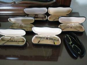 lot 166 image: VINTAGE GLASSES W CASES, AT LEAST 1 IS LEVI STRAUSS BRAND