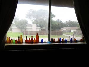 lot 180 image: WINDOW LEDGE OF VINTAGE BOTTLES&nbsp
