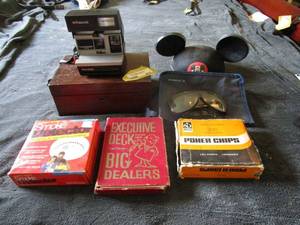 lot 222 image: VINTAGE POLAROID CAMERA, MICKEY EARS CAP, POKER CHIPS, EXECUTIVE DECK CARDS, SMOKE DETECTOR, VINTAGE JEWELRY WOODEN BOX