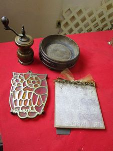 lot 107 image: WOODEN PEPPER GRINDER FROM GERMANY, WOODEN BOWLCANDY DISH, HOT PLATEHOT POT TRIVETS