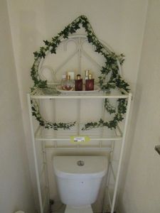 lot 175 image: OVER THE TOILET STANDING SHELF, INCL. PERFUMESCOLOGNES, BRANDS SUCH AS VERA WANG, JIMMY CHOO, OPIUM