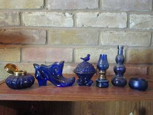 lot 194 image: VINTAGE COBALT BLUE GLASS TRINKETS, BLUE GLASS MINI HURRICAN OIL LAMP, BINTAGE WAVY BOTTLE, COBALT BLUE GLASS SLIPPER HAND PAINTED&nbsp