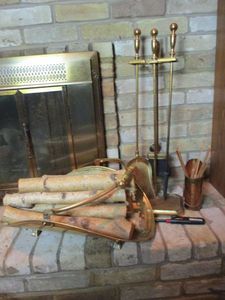 lot 200 image: FIREPLACE TOOL SET, LOG HOLDER, AND TIN OF MATCHES