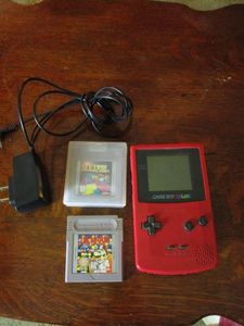 lot 201 image: 1998 GAMEBOY COLOR, WORKING, 2 GAMES INCL., DR. MARIO &amp TETRIS PLUS, HAS POWER CORD