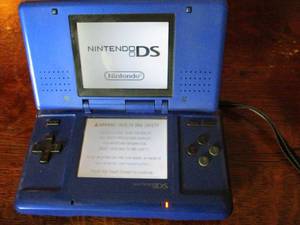 lot 202 image: WORKING NINTENDO DS, INCL. GAME MAGNETICA