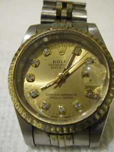 lot 5 image: WOMENS ROLEX OYSTER PERPETUAL DATEJUST, DIAMOND DIAL, INSIDE OF CLASP READS, REGISTERED SWISS MADE, P11 STEELINOX 62523H18, STAMPED 18K NEXT TO CASE BACK, CASE BACK ITSELF HAS NO ENGRAVINGS