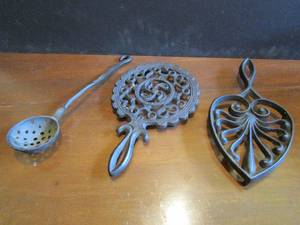 lot 307 image: CAST IRON LADLE &amp HOT POT TRIVETS