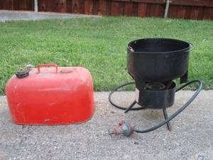 lot 363 image: VINTAGE METAL FUEL CAN, CAST IRON COOKING POT W PROPANE STAND FOR HEATING