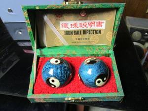 lot 386 image: PAIR OF HEALTHMEDITATION IRON BALLS W CASE & DIRECTIONS FROM BAODING, CHINA