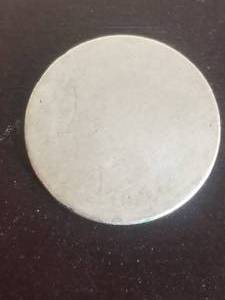 lot 30 image: Believed to be a V-Nickel from 190 - Appears that back of coin was not stamped or worn completely off