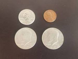 lot 83 image: Selection of American Coins - 1944D Wheat penny, 1974&1973D Kennedy Half Dollars, and 1999 quarter