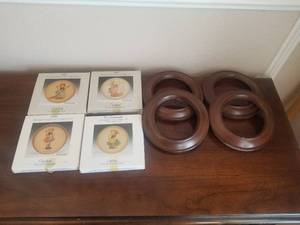 lot 71 image: 1988, 89, 90, and 91 Hummel mini plates - Little Sweeper, Wash Day, A stitch in Time, and Chicken Licken - In boxes with wood frames. Goebel W. Germany