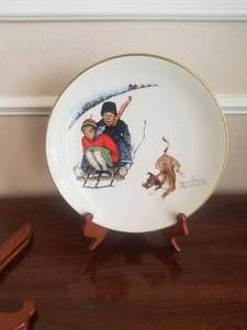 lot 76 image: Norman Rockwell plate with stand - 1972 - Winter-Downhill Daring - Gorham fine china