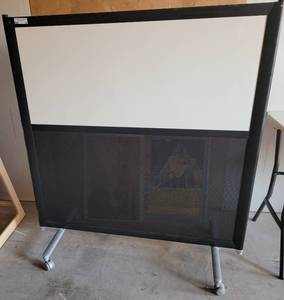 lot 34 image: DOUBLE-SIDED WHITEBOARD  DIVIDER WITH WHEELS.