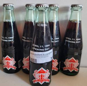 lot 35 image: VINTAGE 1994 THE BALLPARK IN ARLINGTON OPENING DAY COMMEMORATIVE DR. PEPPER BOTTLES AS SHOWN.