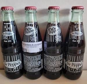 lot 36 image: DUBLIN DR. PEPPER BOTTLES AS SHOWN.