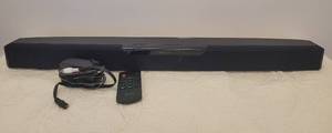 lot 71 image: INSIGNIA SOUND BAR HOME THEATER SPEAKER MODEL NS-SB314 WITH POWER CORD AS SHOWN.