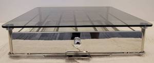 lot 78 image: CHROME FRAME WITH SMOKED GLASS K-CUP HOLDER AS SHOWN.