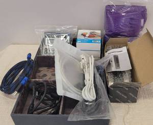 lot 89 image: REMOVEABLE LABELS, CALCULATORS, CORDS AND MORE AS SHOWN.
