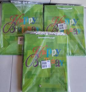 lot 120 image: 3 PACKS OF LARGE SIZE BIRTHDAY GIFT BAGS AS SHOWN. 6-BAGS PER PACK.
