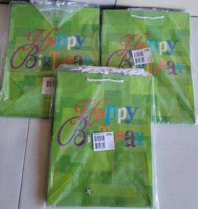 lot 121 image: 3 PACKS OF LARGE SIZE BIRTHDAY GIFT BAGS AS SHOWN. 6-BAGS PER PACK.