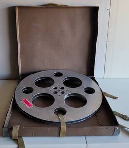 lot 131 image: VINTAGE LARGE SIZE ALUMINUM MOVIE REEL WITH SHIPPING BOX AS SHOWN.