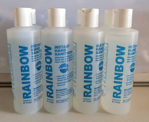 lot 159 image: LOT OF 8 BOTTLES OF HAND SANITIZER AS SHOWN.