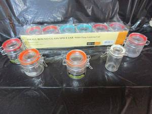 lot 24 image: SMALL ROUND SPICE JARS WCLASP LOCKING LIDS