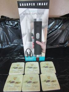 lot 33 image: SHARPER IMAGE AUTOMATIC WINE BOTTLE OPENER I BOX &amp CERAMIC COASTERS WINE THEMED