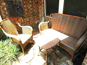 lot 1 image: WICKER PATIO SET, ARM CHAIR, LOVE SEAT &amp TABLE W FAUX BAMBOO TRIM