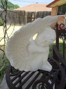 lot 80 image: SLEEPY ANGEL STATUE