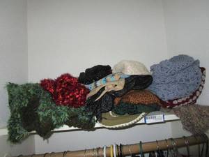lot 211 image: CLOSET SHELF WSCARVES, THROWS, &amp MORE