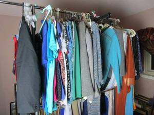 lot 311 image: VARIETY OF WOMENS CLOTHING, CLOTHING RACK NOT INCLUED.