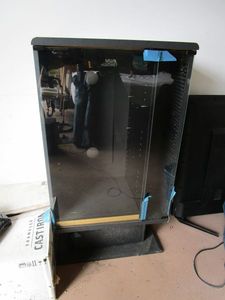 lot 341 image: ENTERTAINMENT CENTER WITH GLASS DOOR